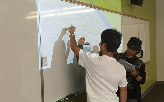 Residents working on a whiteboard