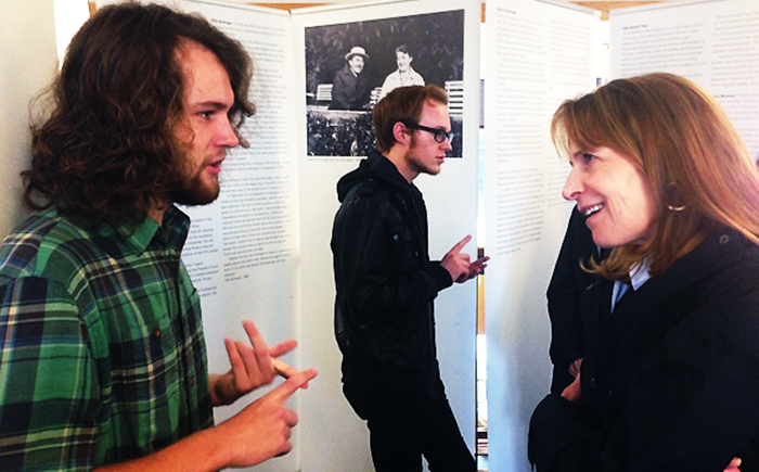 A student and faculty member in a residential immersion program talking